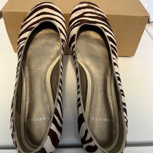 Carvella animal hair leather pumps.